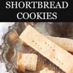 Traditional 3 ingredient shortbread cookies sliced into bars and poked with holes