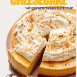 Baked pumpkin cheesecake made with a graham cracker crumb crust on the bottom and topped with whipped cream and graham cracker crumbs.