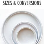 A stack of round cake pans in different sizes.