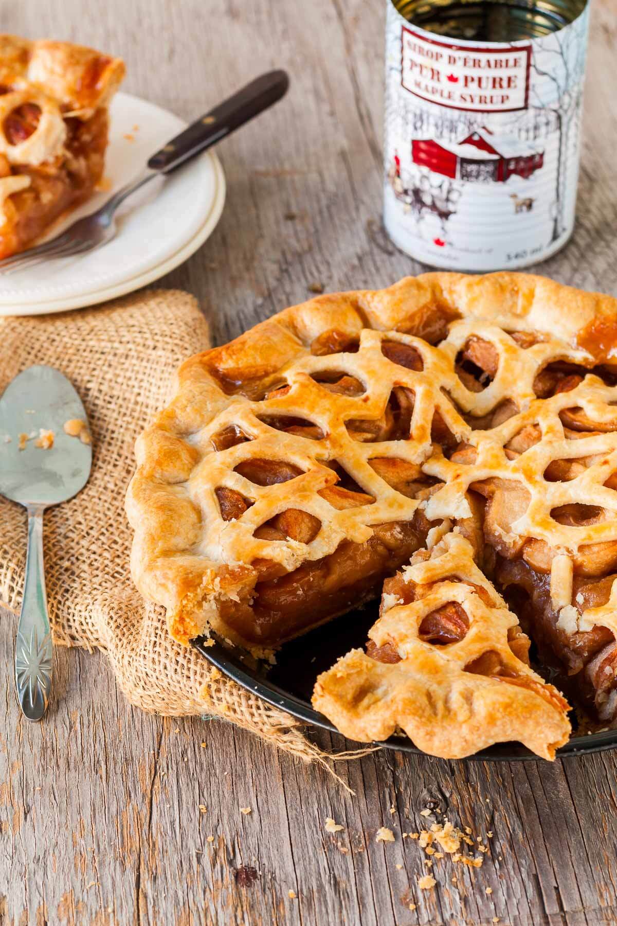Slicing and serving an apple pie made with maple-roasted apples.