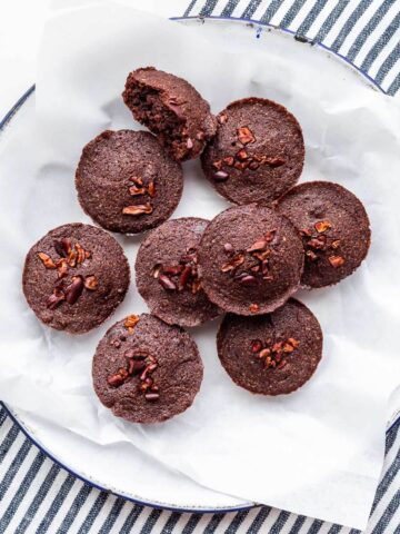 A plate of chocolate financiers ready to be eaten.