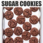 A sheet pan of freshly baked chocolate sugar cookies.