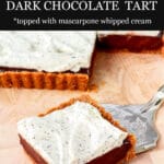 Square tart filled with dark chocolate ganache and topped with whipped cream flecked with Earl Grey tea leaves