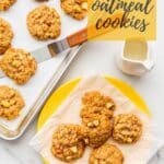 Transferring apple oatmeal cookies to a plate to serve them.