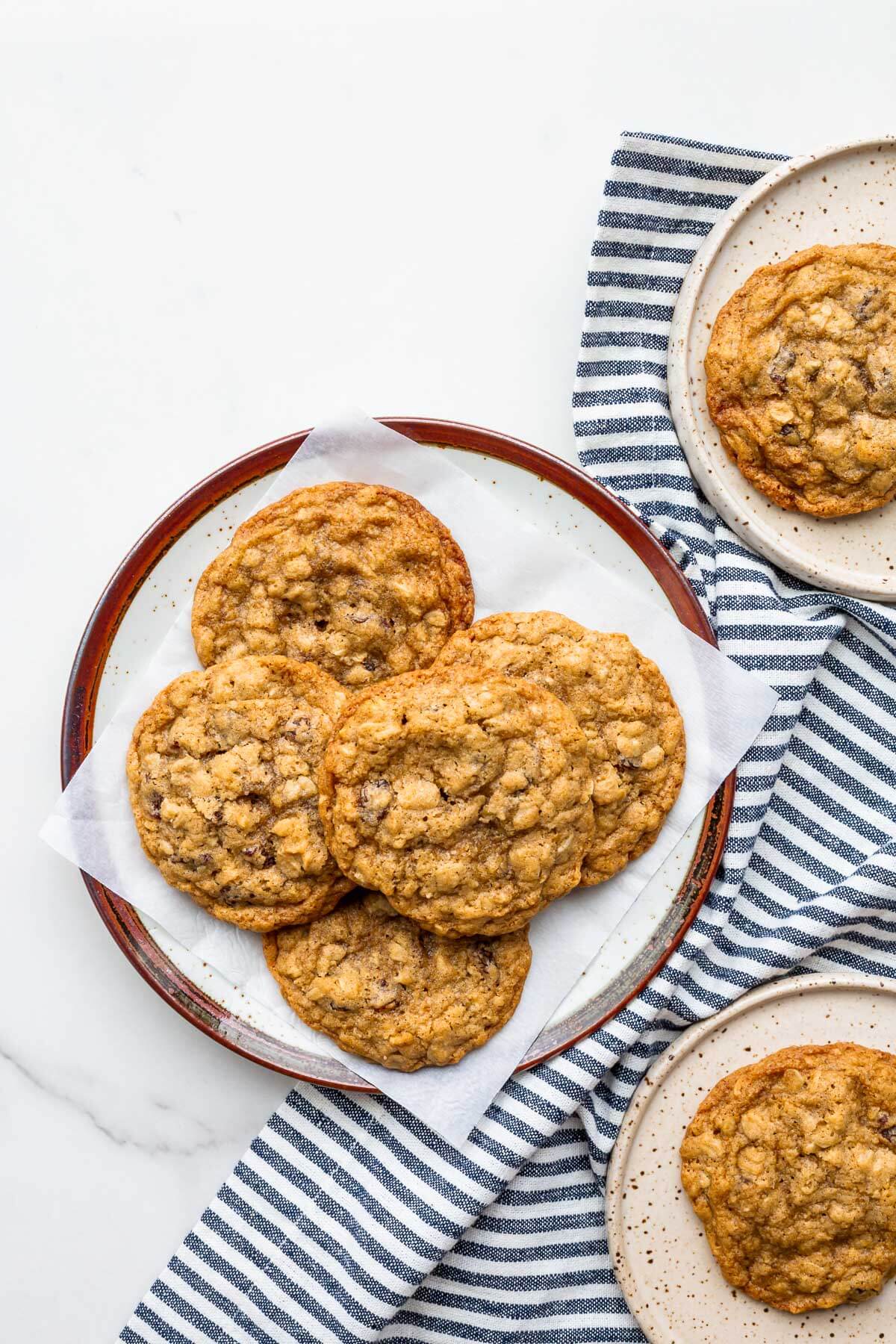 Plates of oatmeal raisin cookies.