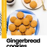 Plates of round gingerbread cookies served with a cup of coffee.