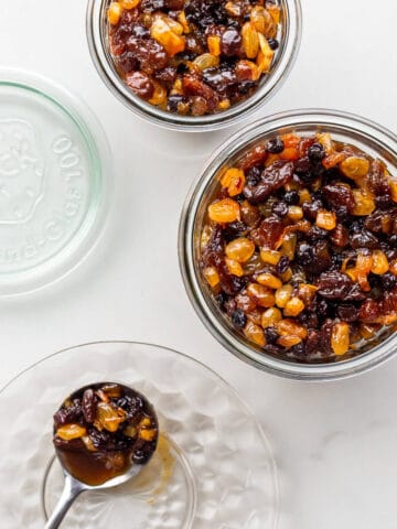 Transferring homemade mincemeat filling to jars to store for making mincemeat tarts.