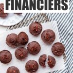 Chocolate financiers on a cooling rack with text overlay that reads "chocolate financiers".