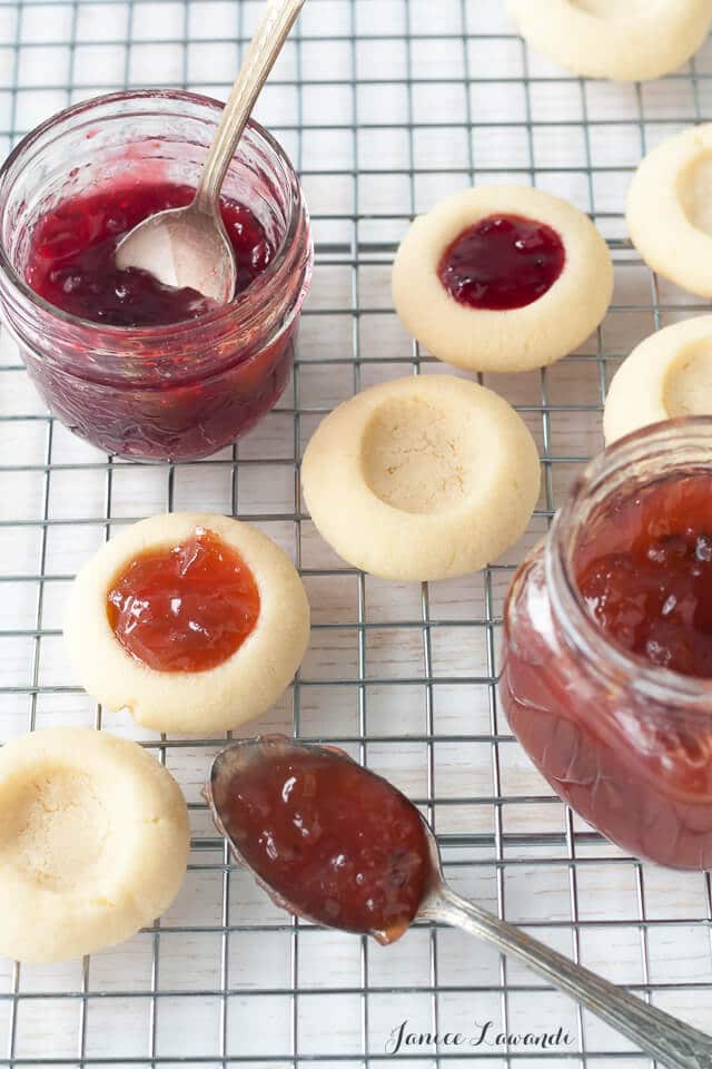 Filling jam thumbprint cookies