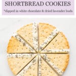 lavender shortbread cookies baked in a fluted tart pan for a scalloped edge, then cut into wedges and dipped in white chocolate and lavender buds