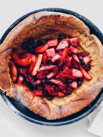 Dutch baby pancake topped with mixed fruit