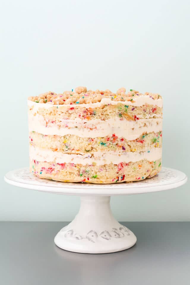 Momofuku Milk Bar birthday cake with layers of sprinkle cake and birthday cake crumbs