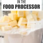 Butter and flour in a food processor bowl to make pie crust dough.