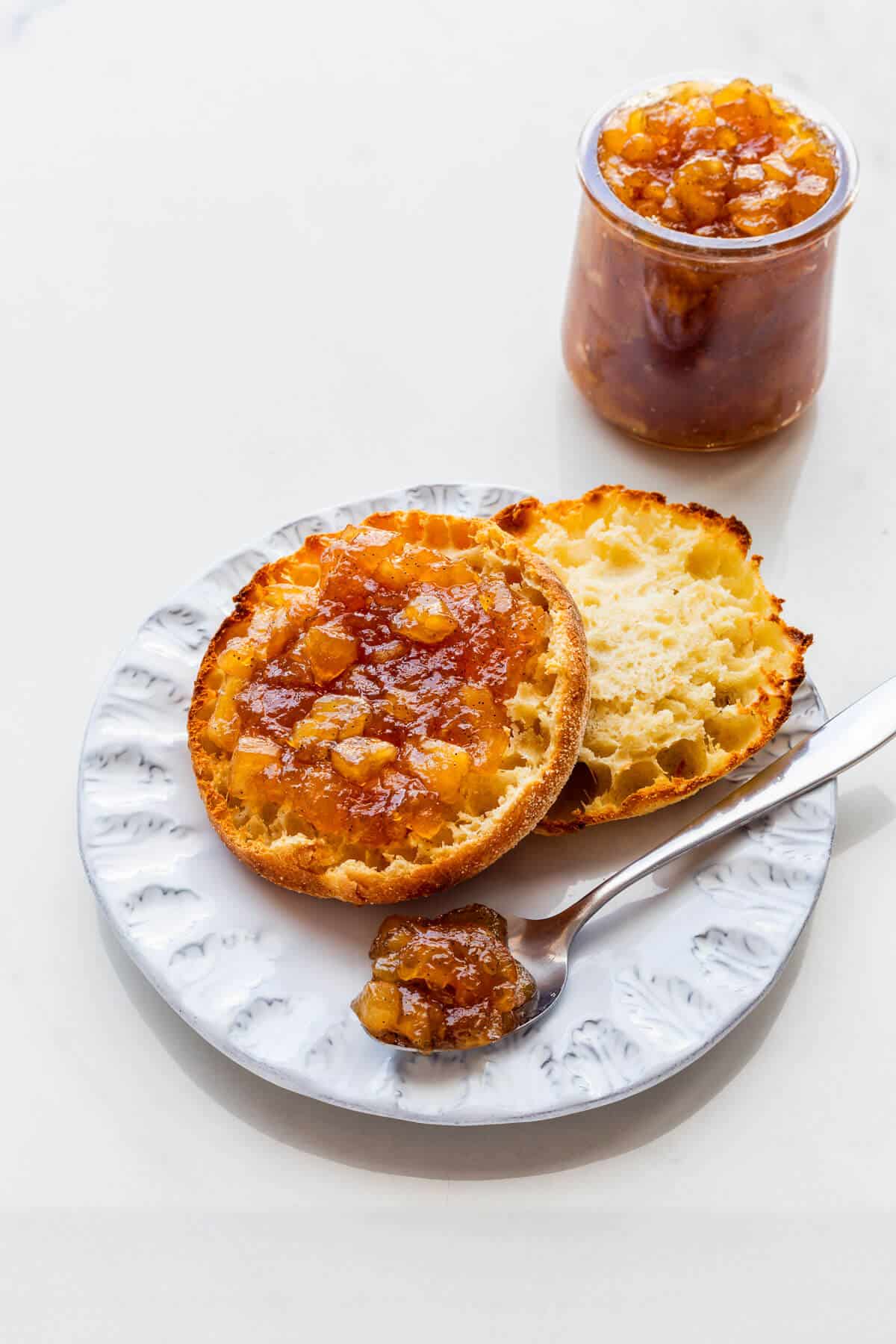Homemade apple pie jam served with an English muffin.