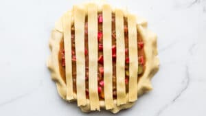 To weave lattice crust start with 6 strips of dough placed vertically side by side evenly spaced
