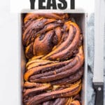 Freshly baked babka in a loaf pan.